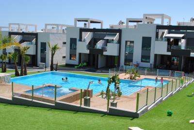 Beneden appartement in Oasis Beach Punta Prima 8 Nº 039 in España Casas